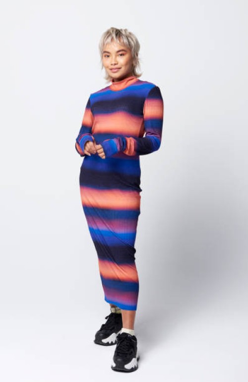 full length portrait of young fashionable woman - fashion stock pictures, royalty-free photos & images