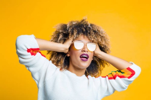 funky afro girl against yellow background - fashion stock pictures, royalty-free photos & images