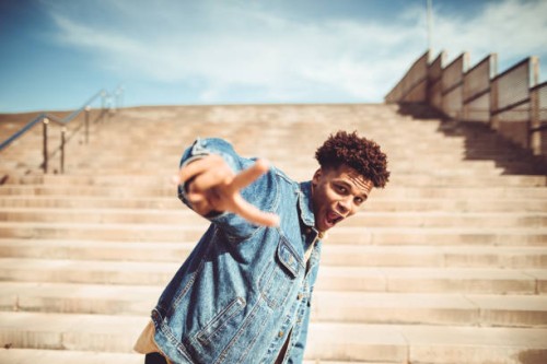 funky man portrait gesturing in the city - fashion stock pictures, royalty-free photos & images