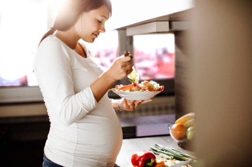 future mother eating healthy food - food stock pictures, royalty-free photos & images