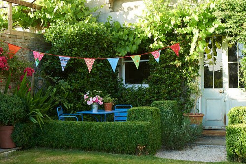 garden and bunting in summer - garden decoration stock pictures, royalty-free photos & images