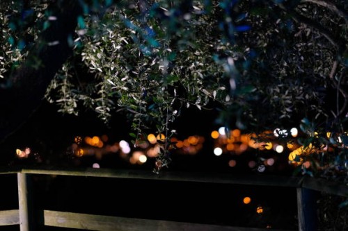 garden at night with city lights in the background - garden decoration stock pictures, royalty-free photos & images