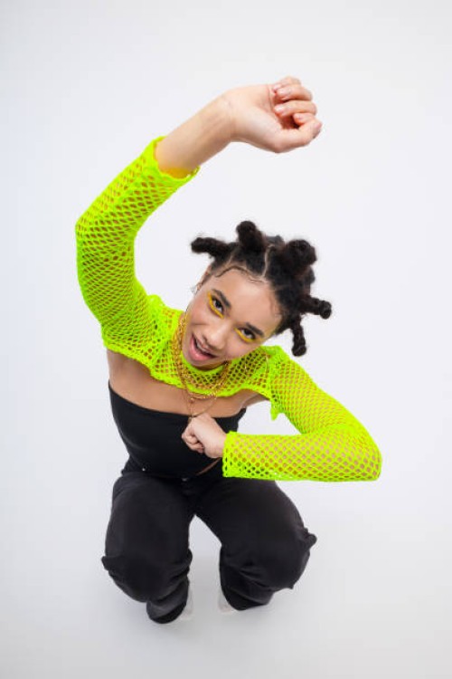 gen z teen girl posing against white background - fashion stock pictures, royalty-free photos & images