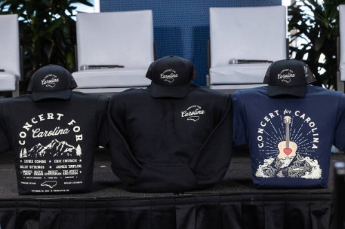 General view is seen of merchandise for the Concert for Carolina at Bank of America Stadium on October 26, 2024 in Charlotte, North Carolina.