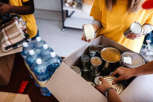 generous people helping to poor people - food stock pictures, royalty-free photos & images
