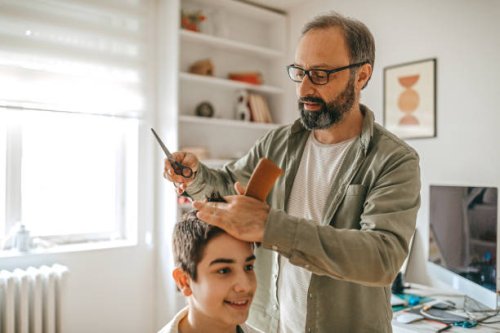 getting haircut done at home - hairstyle stock pictures, royalty-free photos & images