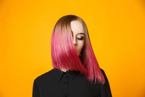 girl with dyed hair waving head - fashion stock pictures, royalty-free photos & images