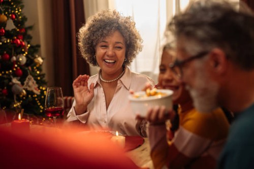 girl with grandparents at christmas lunch - food stock pictures, royalty-free photos & images
