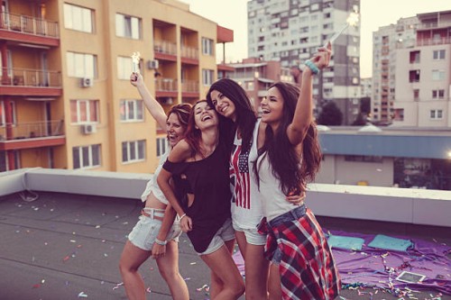 girls partying on the rooftop - garden decoration stock pictures, royalty-free photos & images