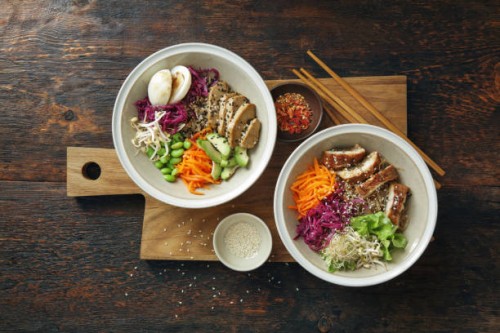 glass noodle stir-fry with eel and vegan poke bowl - junk food stock pictures, royalty-free photos & images