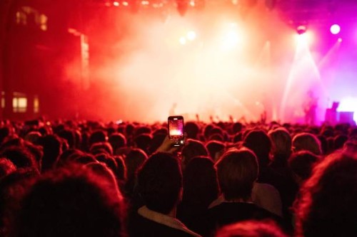 Global shot of the crowd attending a concert at le centquatre for the Inrocks Festival in Paris Ile de France on March 5, 2025. The 5 nights music...