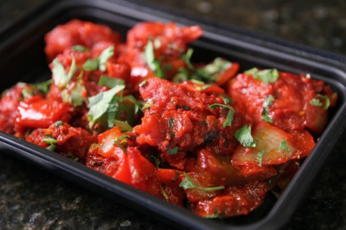 Gobi Manchurian is pictured in a take-out container from Little India Express in Lexington, MA on Dec. 13, 2017.