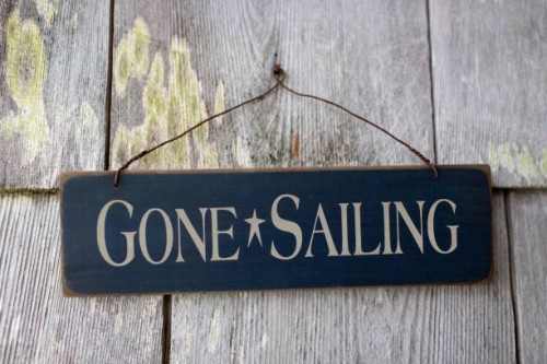 gone sailing sign hanging on side of house - home decoration stock pictures, royalty-free photos & images