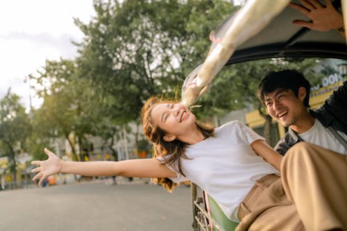 good-humored couples enjoy memorable moments together in a tuk-tuk. - travel stockfoto's en -beelden