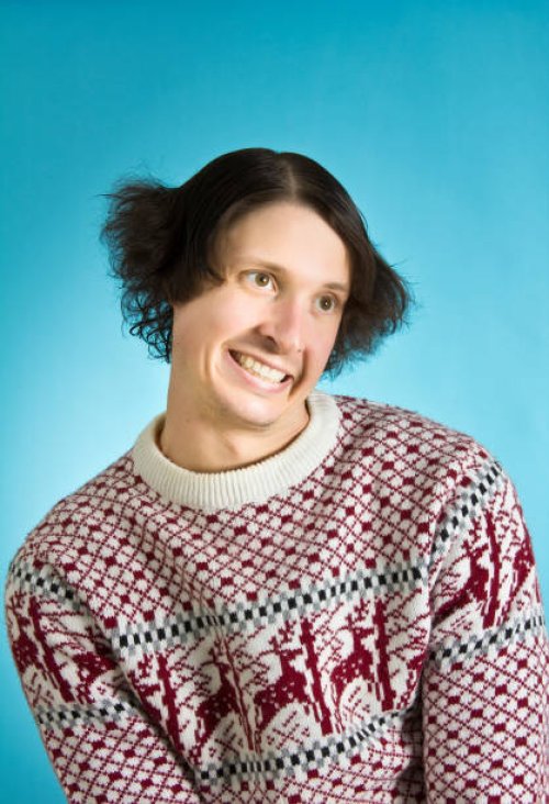 goofy holiday sweater man - hairstyle stockfoto's en -beelden