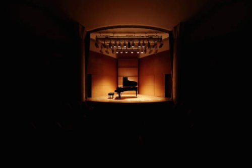 grand piano on concert hall stage - concert stock pictures, royalty-free photos & images