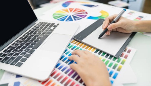 graphic designer at work. color swatch samples. artist drawing something on graphic tablet at the office. graphic designer creativity editor ideas designer concept - fashion stock pictures, royalty-free photos & images
