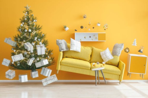 gravity concepts. yellow living room with christmas tree - home decoration stock pictures, royalty-free photos & images