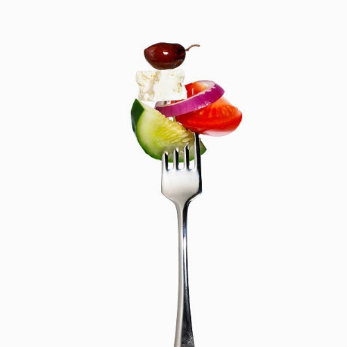 greek salad on a fork - food stock pictures, royalty-free photos & images