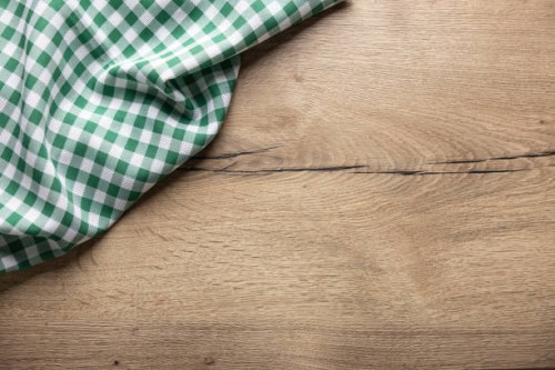 green checkered kitchen tablecloth on wooden table. - food stock pictures, royalty-free photos & images