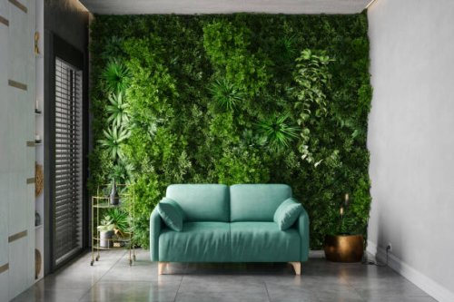 green living room with turquoise color sofa, vertical garden and tiled floor - garden decoration stock pictures, royalty-free photos & images