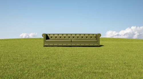 green sofa in grass - garden decoration stock pictures, royalty-free photos & images