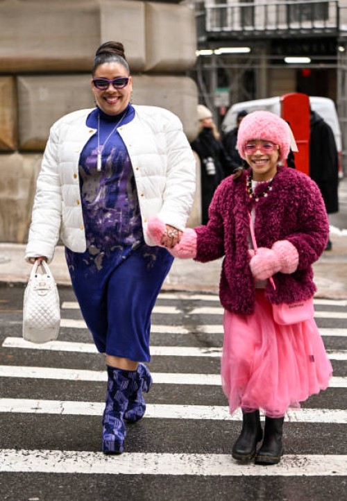 Greivy Lou is seen wearing a Ann Taylor jacket, Misook dress, Prada boots, Brahmin bag, Karl Lagerfeld sunglasses, Lagos & German Kabirski rings,...