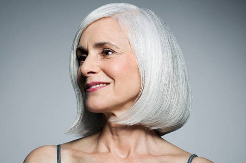 grey haired woman in 3/4 postion, portrait. - hairstyle stock pictures, royalty-free photos & images