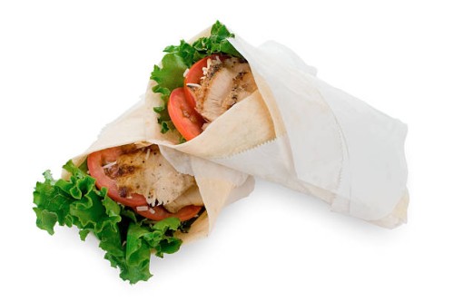grilled chicken caesar wraps - junk food stock pictures, royalty-free photos & images