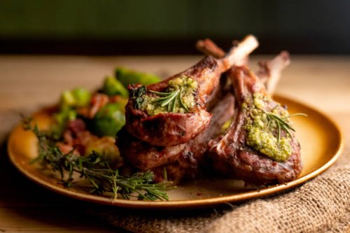grilled new zealand lamb chops plated with sauteed brussel sprouts - food stock pictures, royalty-free photos & images