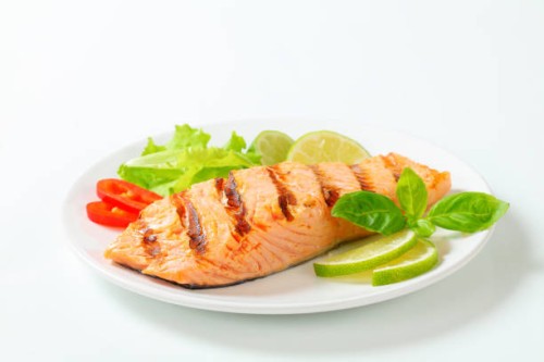 grilled salmon steak on a plate - food stock pictures, royalty-free photos & images