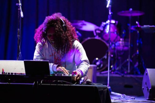 grinning dj performing at music venue - concert stock pictures, royalty-free photos & images