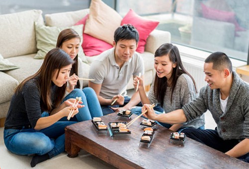 group of asian friends - junk food stock pictures, royalty-free photos & images