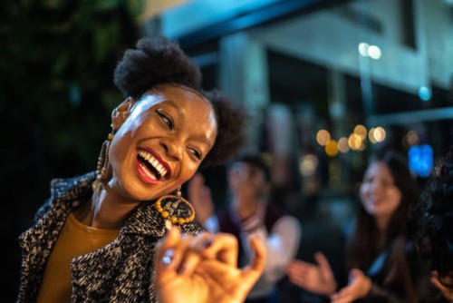 group of friends dancing outside at night - fashion stock pictures, royalty-free photos & images