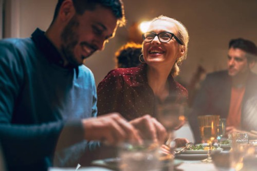 group of friends having fun during a dinner celebration - food stockfoto's en -beelden
