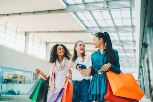 group of friends in the shopping mall - fashion stock pictures, royalty-free photos & images