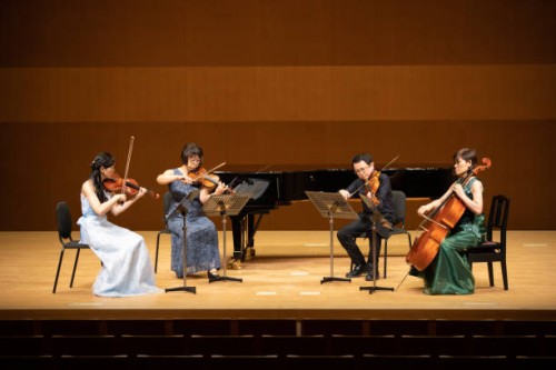group of musicians playing instruments at classical concert - concert stock pictures, royalty-free photos & images