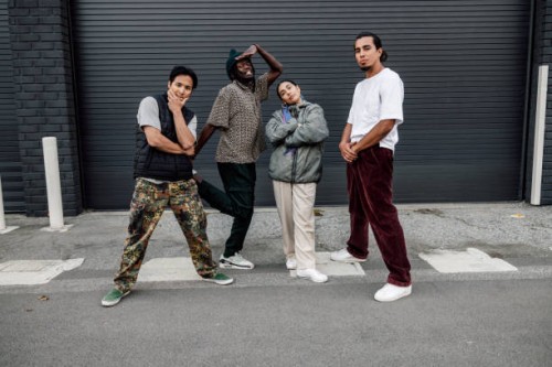group of street hip hop breakdancers posing looking to camera - fashion stock pictures, royalty-free photos & images