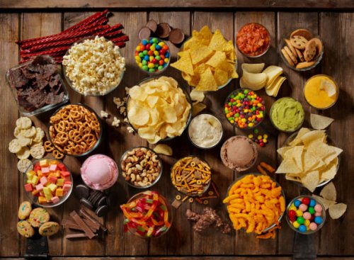 group of sweet and salty snacks, perfect for binge watching - junk food stock pictures, royalty-free photos & images