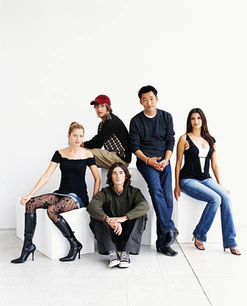group of young adults sitting in studio, portrait - fashion stock pictures, royalty-free photos & images