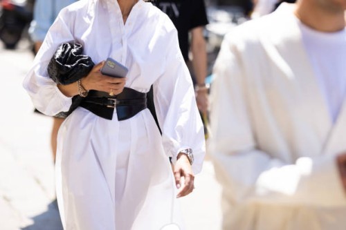 Guest is seen wearing a dress shirt with leather belt outside Valentino show during the Milan Fashion Week - Menswear Spring/Summer 2024 on June 16,...