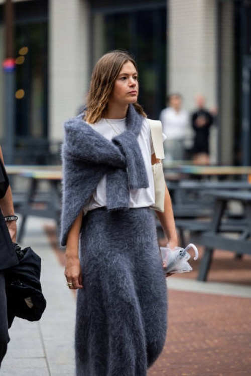 Guest is seen wearing grey skirt outside Simone Rocha during London Fashion Week September 2023 on September 17, 2023 in London, England.