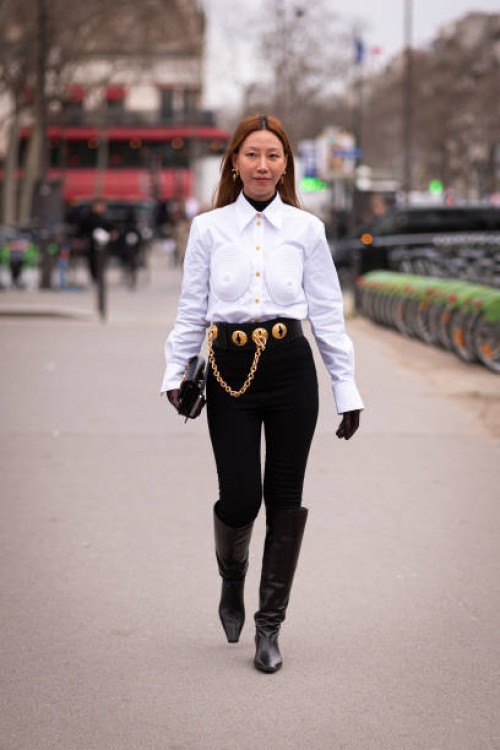Guest wearing a Schiaparelli look, is seen outside Chanel, during Paris Fashion Week - Womenswear Fall Winter 2023 2024, on March 07, 2023 in Paris,...