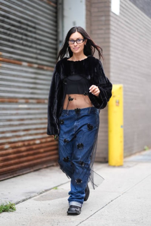 Guest wears, outside XXX, during New York Fashion Week, on September 07, 2024 in New York City.