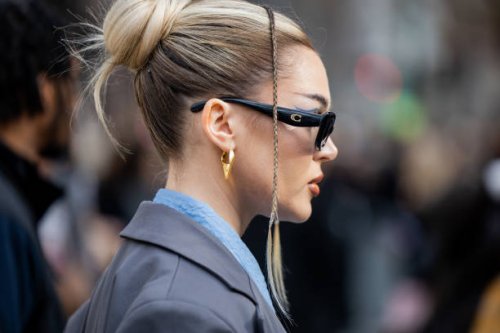 Guest wears sunglasses outside Coach on February 12, 2024 in New York City.