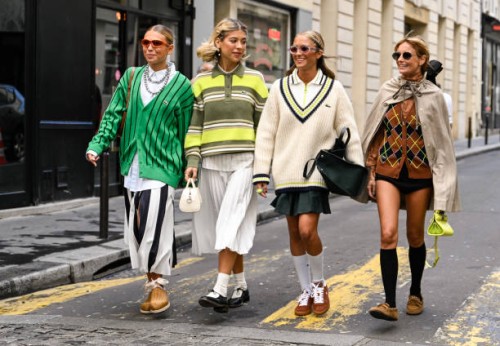 Guests are seen wearing Lacoste outfits outside the Lacoste show during Womenswear Spring/Summer 2025 as part of Paris Fashion Week on October 01,...