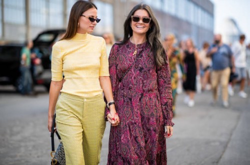 Guests seen outside Ganni during the Copenhagen Fashion Week Spring/Summer 2019 on August 9, 2018 in Copenhagen, Denmark.