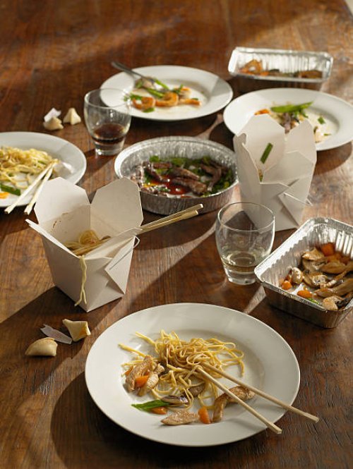 half-eaten chinese takeout dinner - junk food stock pictures, royalty-free photos & images