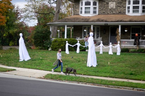 Halloween decorations stand on a front yard of a home in the Mt Airy neighborhood of Philadelphia, PA on October 24, 2020. The even is held to...
