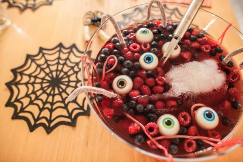 halloween dessert with berries and floating eyeballs, close-up - food stock pictures, royalty-free photos & images